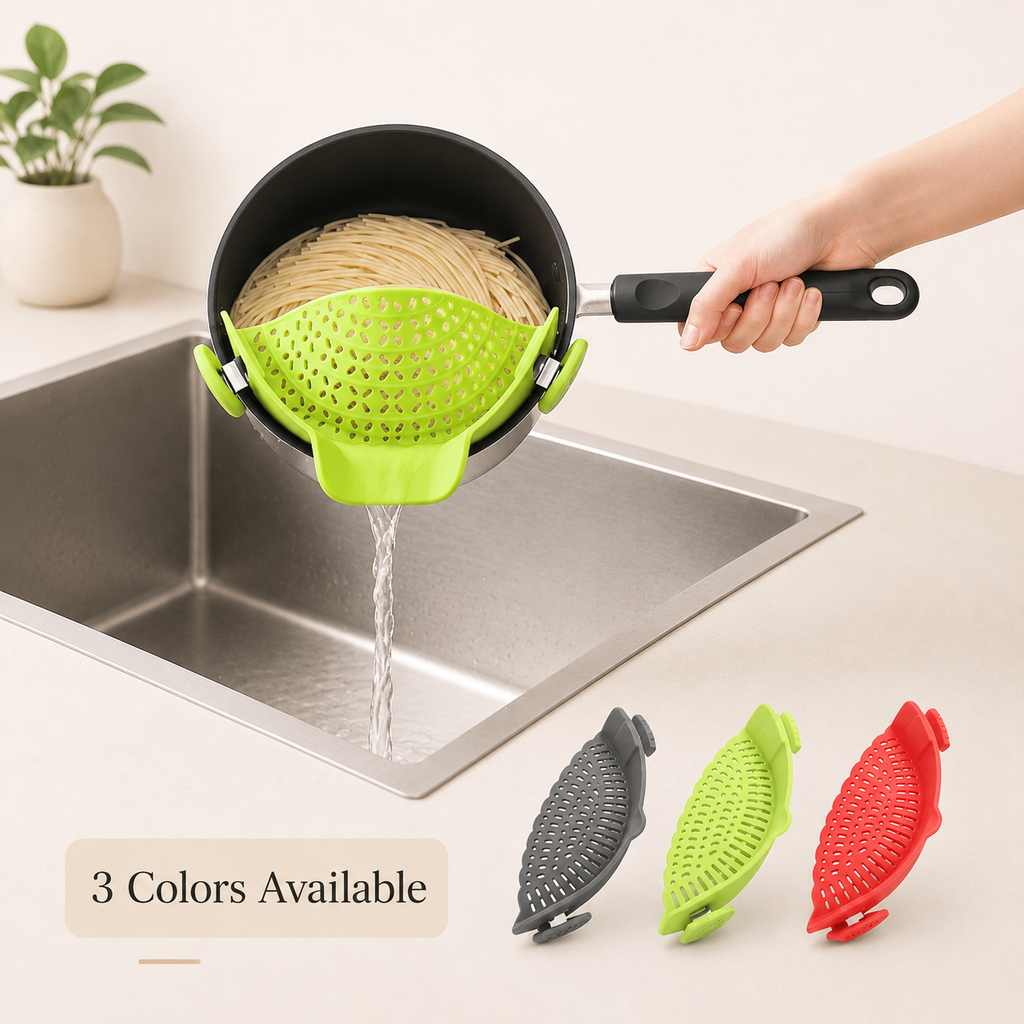 Green quick-drain pasta strainer clipped over a sink, water flowing through perforations