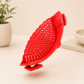 Red perforated silicone pasta strainer insert with clip grips for draining