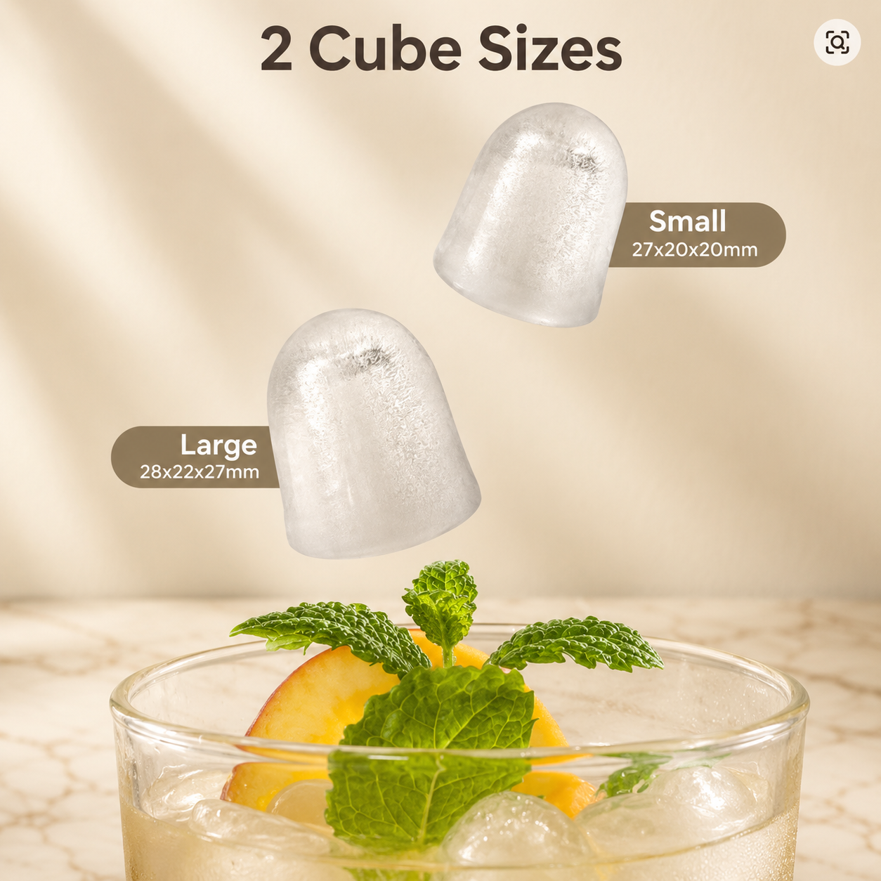 Two-size clear ice cubes, small and large, shown above a drink