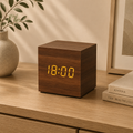 LED wooden clock with warm brown finish and glowing amber time display