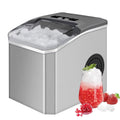 Grey countertop ice maker with open top and ice bin, producing clear ice cubes